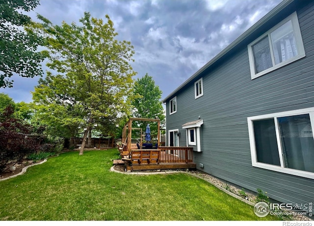 1202 Creekwood Ct, Windsor, CO 80550 - view of yard with a deck