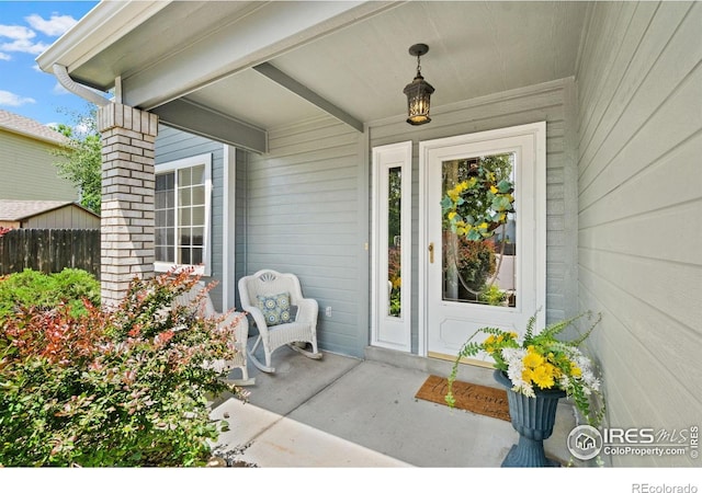 1202 Creekwood Ct, Windsor, CO 80550 - view of exterior entry with covered porch