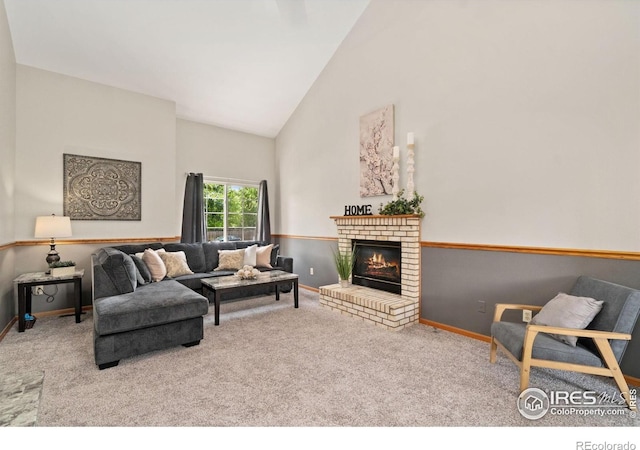 1202 Creekwood Ct, Windsor, CO 80550 - carpeted living room with high vaulted ceiling, baseboards, and a fireplace
