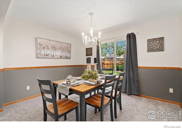 1202 Creekwood Ct, Windsor, CO 80550 - carpeted dining room with a chandelier and baseboards