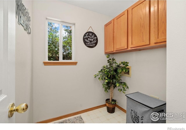 1202 Creekwood Ct, Windsor, CO 80550 - washroom with light flooring, hookup for a washing machine, and baseboards