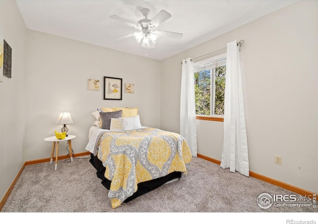 1202 Creekwood Ct, Windsor, CO 80550 - carpeted bedroom featuring baseboards and a ceiling fan