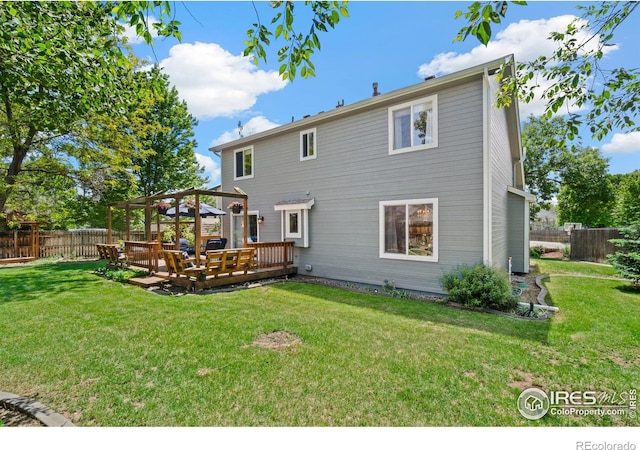 1202 Creekwood Ct, Windsor, CO 80550 - rear view of property with a wooden deck and a gazebo