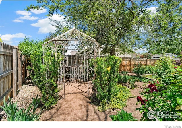 1202 Creekwood Ct, Windsor, CO 80550 - gate with a fenced backyard