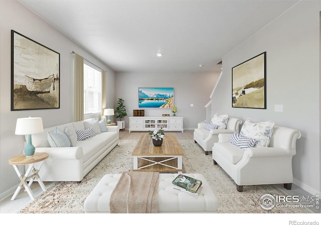 6300 Globeflower St, Wellington, CO 80549 - living area with baseboards and wood finished floors