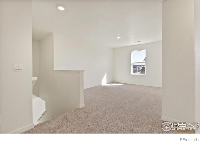 6300 Globeflower St, Wellington, CO 80549 - unfurnished room featuring carpet, baseboards, and recessed lighting