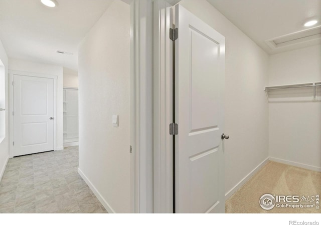 6300 Globeflower St, Wellington, CO 80549 - hall with baseboards, recessed lighting, and light flooring