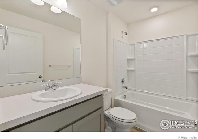 6300 Globeflower St, Wellington, CO 80549 - bathroom featuring bathing tub / shower combination, vanity, and toilet