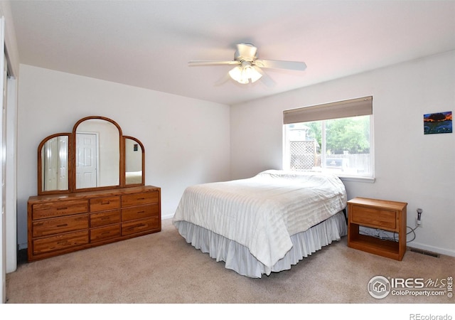 1131 Sandra Dr, Johnstown, CO 80534 - carpeted bedroom featuring ceiling fan and baseboards