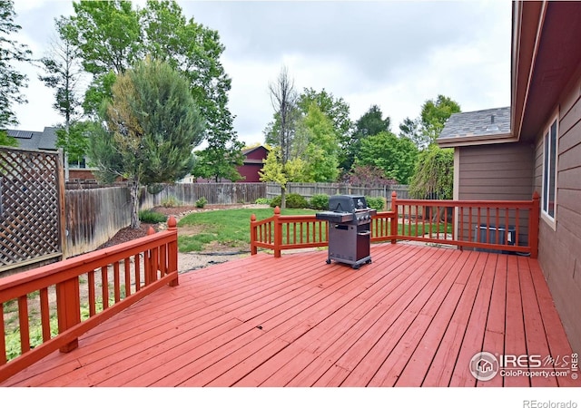 1131 Sandra Dr, Johnstown, CO 80534 - wooden terrace featuring grilling area
