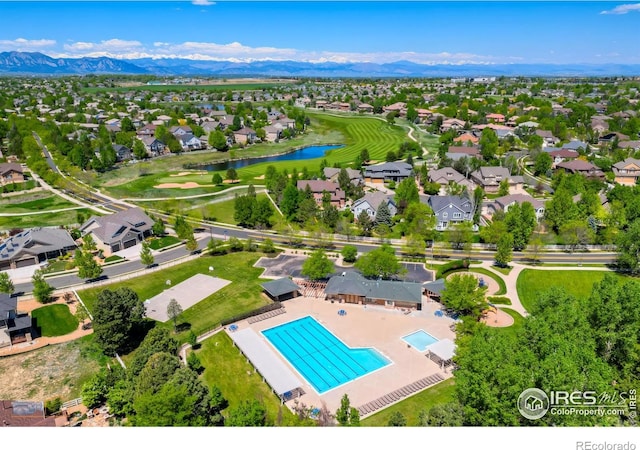 4725 Spyglass Dr, Broomfield, CO 80023 - aerial perspective of suburban area with a water and mountain view and a pool