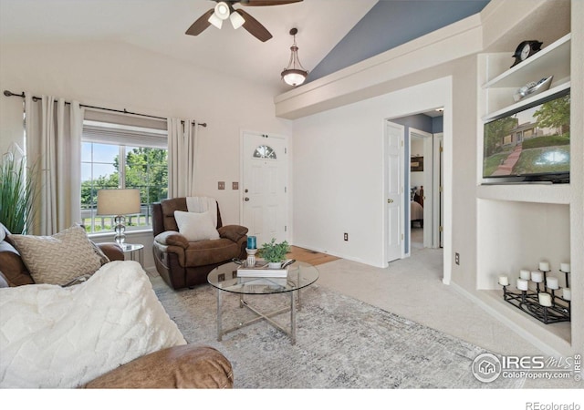 4725 Spyglass Dr, Broomfield, CO 80023 - living room featuring vaulted ceiling, a ceiling fan, carpet floors, and baseboards