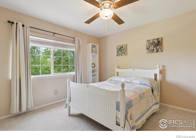 4725 Spyglass Dr, Broomfield, CO 80023 - bedroom with carpet flooring, baseboards, and a ceiling fan