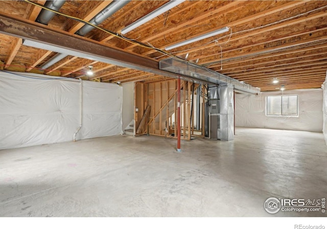 315 Laurel Ave, Eaton, CO 80615 - basement featuring heating unit and stairway