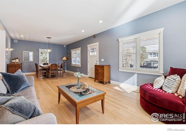 3561 4th St, Boulder, CO 80304 - living room with light wood-style floors, recessed lighting, and baseboards