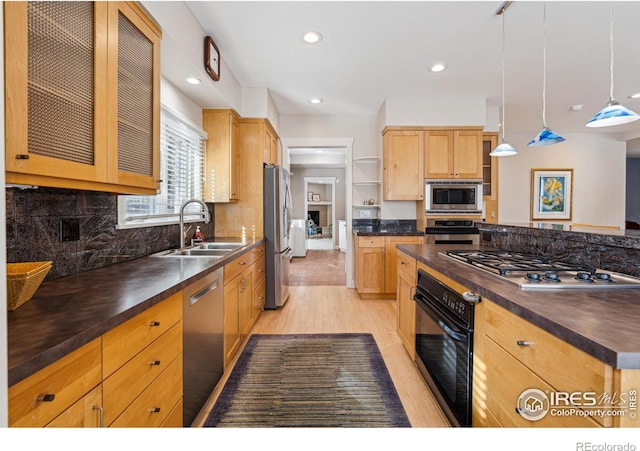3561 4th St, Boulder, CO 80304 - kitchen featuring stainless steel appliances, dark countertops, a sink, open shelves, and light wood-type flooring