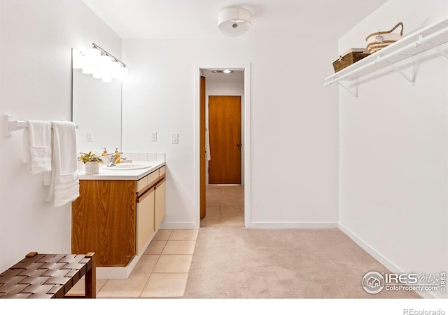 3805 Northbrook Dr Unit A, Boulder, CO 80304 - bathroom featuring vanity, tile patterned flooring, and baseboards