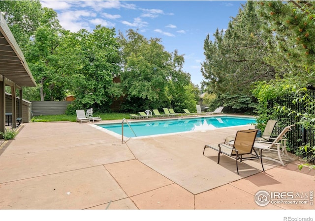 3805 Northbrook Dr Unit A, Boulder, CO 80304 - outdoor pool with a patio and view of scattered trees