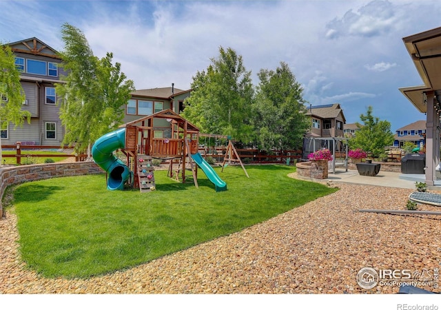 9527 Loveland Way, Arvada, CO 80007 - view of jungle gym with a yard