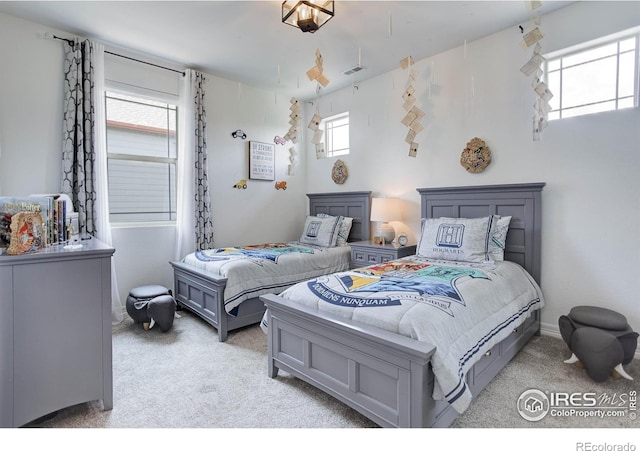 9527 Loveland Way, Arvada, CO 80007 - bedroom with light carpet