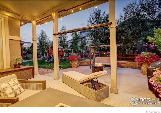 9527 Loveland Way, Arvada, CO 80007 - view of patio / terrace featuring an outdoor fire pit