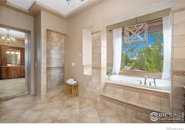 8236 County Road 74, Windsor, CO 80550 - full bath with a bath, vanity, and a chandelier