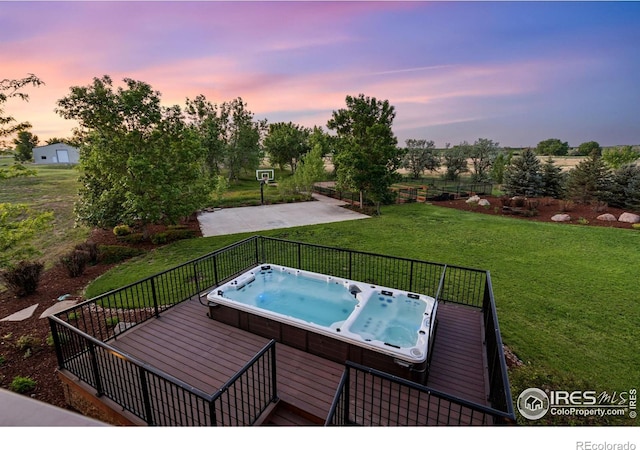8236 County Road 74, Windsor, CO 80550 - view of swimming pool with a hot tub and a yard