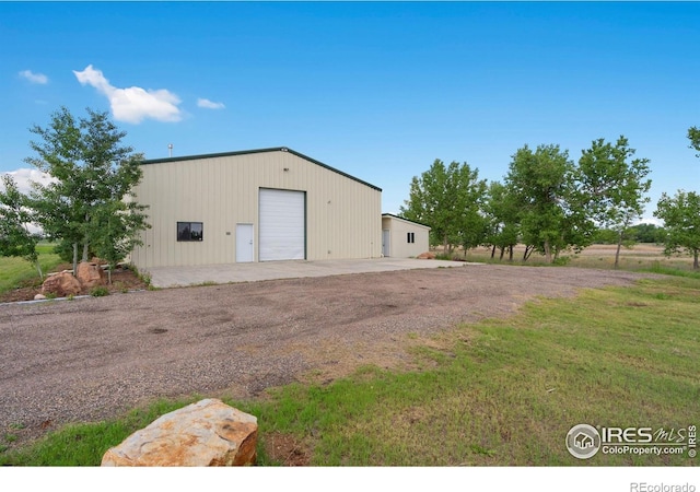 8236 County Road 74, Windsor, CO 80550 - view of pole building with driveway