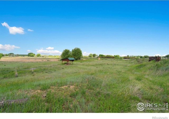 8236 County Road 74, Windsor, CO 80550 - view of yard featuring a view of countryside