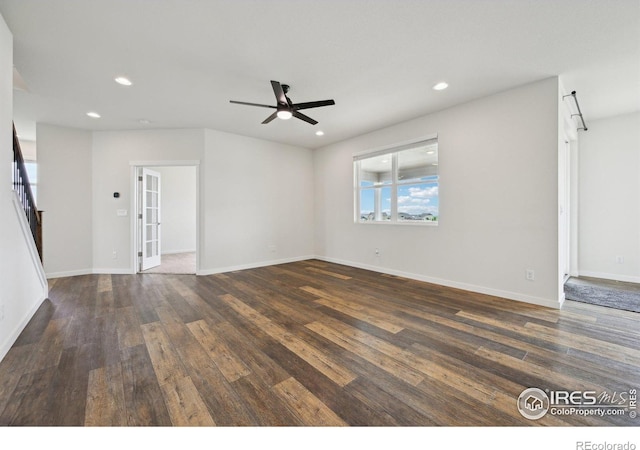 961 Mouflon Dr, Severance, CO 80550 - unfurnished living room with ceiling fan, wood-type flooring, recessed lighting, and baseboards
