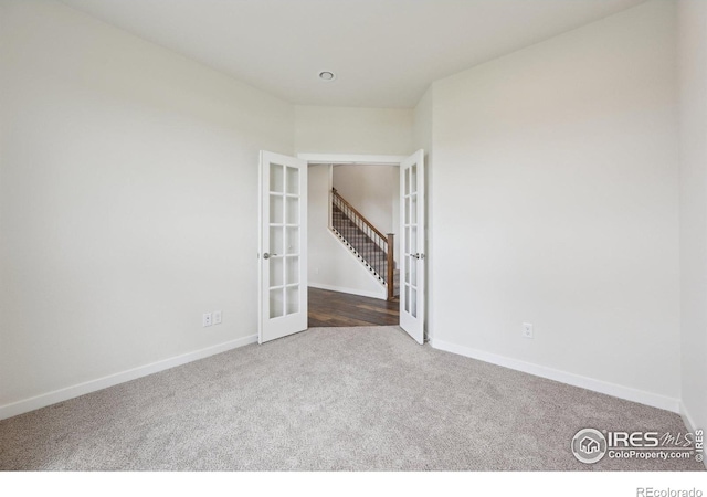 961 Mouflon Dr, Severance, CO 80550 - carpeted spare room with french doors and baseboards
