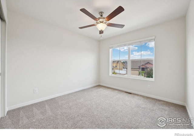 961 Mouflon Dr, Severance, CO 80550 - carpeted spare room with baseboards and a ceiling fan