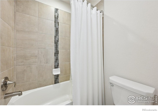 961 Mouflon Dr, Severance, CO 80550 - bathroom featuring shower / bath combination with curtain and toilet
