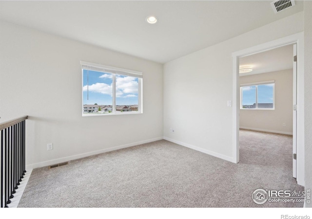 961 Mouflon Dr, Severance, CO 80550 - unfurnished room featuring carpet, baseboards, and recessed lighting