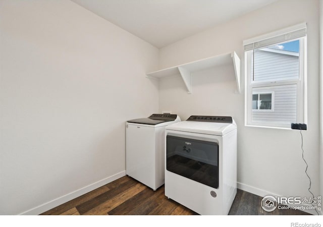 961 Mouflon Dr, Severance, CO 80550 - washroom featuring washer and dryer, baseboards, and dark wood-style flooring