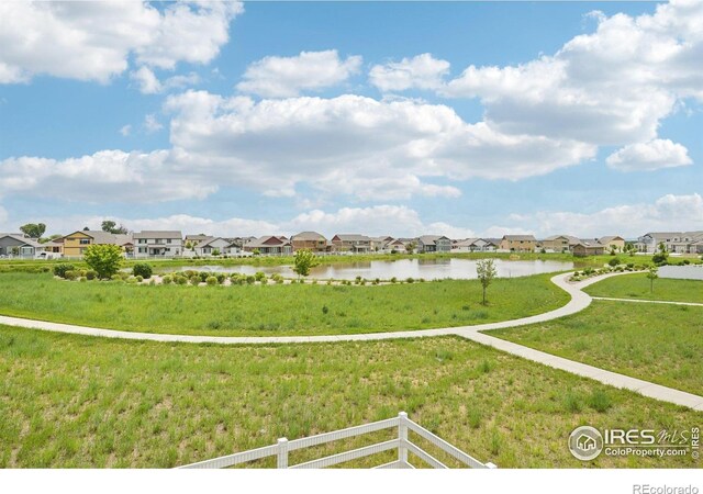 961 Mouflon Dr, Severance, CO 80550 - view of yard with a residential view and a water view