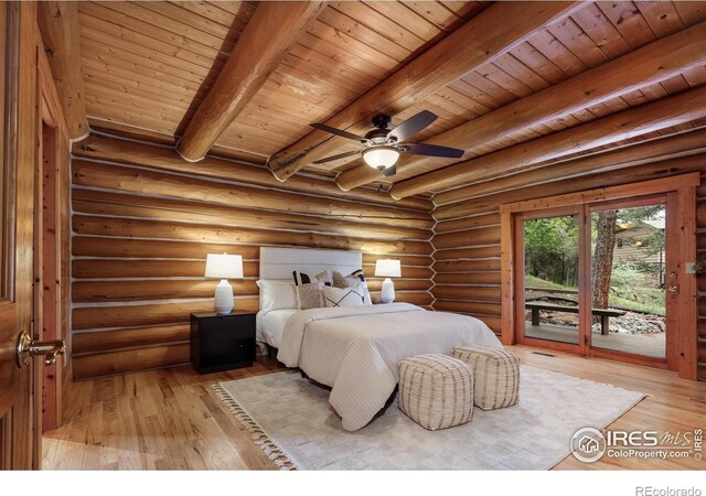 28 Ute Crossing Ct, Lyons, CO 80540 - bedroom with access to outside, light wood-style floors, and wood ceiling with exposed beams
