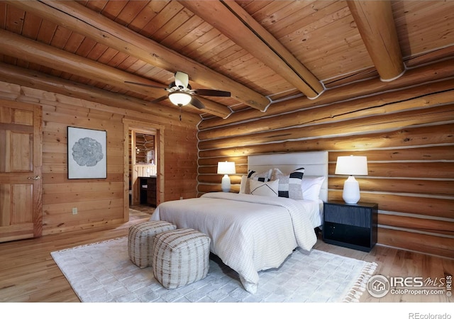 28 Ute Crossing Ct, Lyons, CO 80540 - bedroom featuring wooden ceiling with exposed beams and light wood finished floors