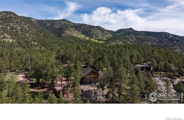 28 Ute Crossing Ct, Lyons, CO 80540 - mountain view featuring a forest
