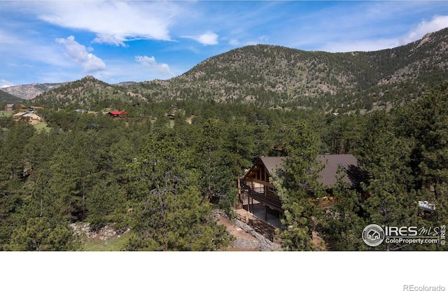 28 Ute Crossing Ct, Lyons, CO 80540 - mountain view featuring a heavily wooded area