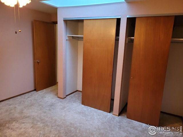 1918 Sumac Pl, Longmont, CO 80501 - unfurnished bedroom featuring carpet floors and two closets