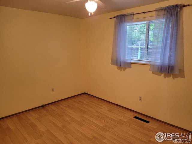 1918 Sumac Pl, Longmont, CO 80501 - spare room featuring light wood-type flooring, ceiling fan, and baseboards