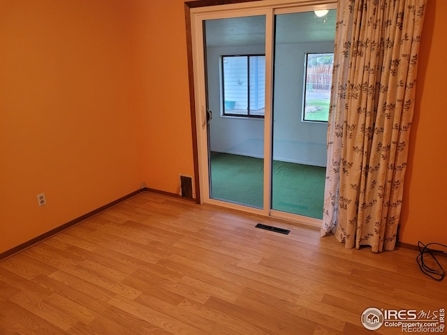 1918 Sumac Pl, Longmont, CO 80501 - unfurnished room with light wood-type flooring and baseboards