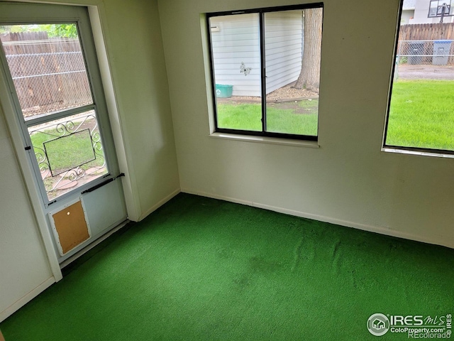 1918 Sumac Pl, Longmont, CO 80501 - carpeted empty room with baseboards