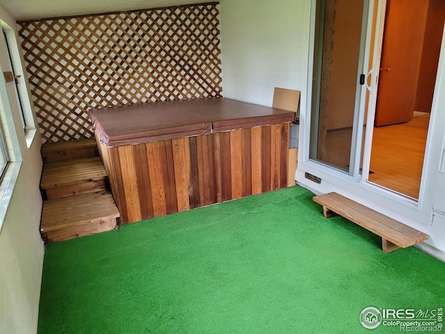 1918 Sumac Pl, Longmont, CO 80501 - sunroom featuring a hot tub