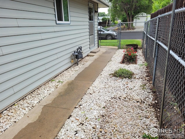 1918 Sumac Pl, Longmont, CO 80501 - view of yard featuring a gate