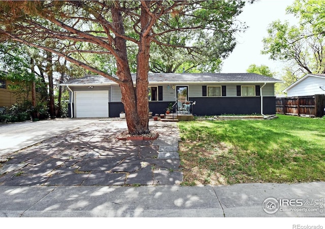 1405 Village Ln, Fort Collins, CO 80521 - ranch-style home featuring concrete driveway and an attached garage