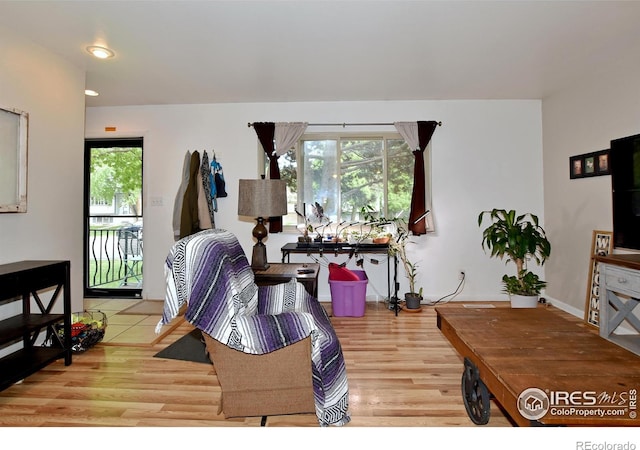 1405 Village Ln, Fort Collins, CO 80521 - living room with wood finished floors and recessed lighting
