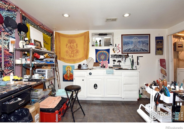 1405 Village Ln, Fort Collins, CO 80521 - miscellaneous room with dark tile patterned flooring and recessed lighting