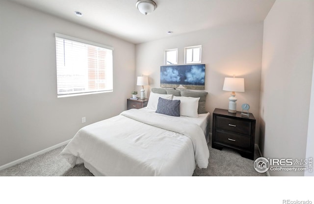 3356 Streamwood Dr, Johnstown, CO 80534 - carpeted bedroom with baseboards